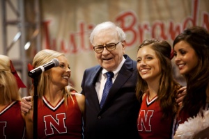 Warren Buffett sings with University of Nebraska cheerleaders during the Berkshire Hathaway Annual shareholders meeting in Omaha
